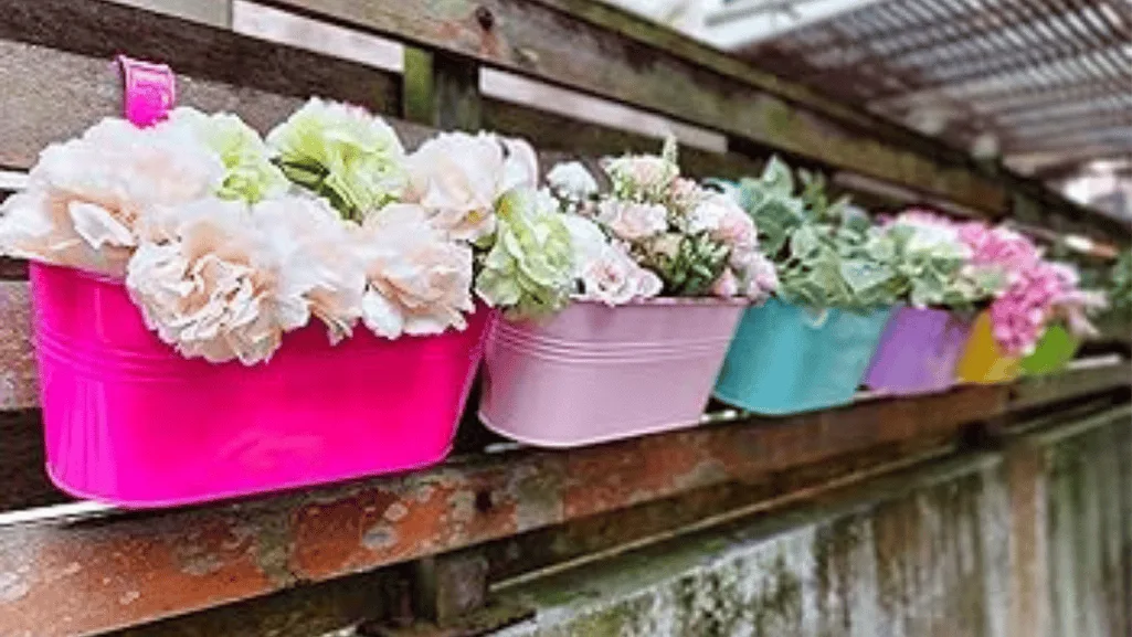 Colorful outdoor flower pots on a balcony garden